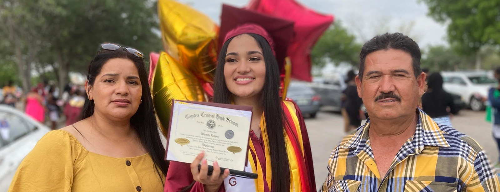 scholarship recipient and her parents